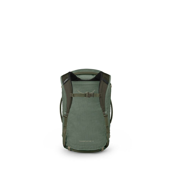 A green technical backpack shown from the back, featuring a grid-patterned fabric body, dark shoulder straps, and a top carry loop, set against a plain white background.