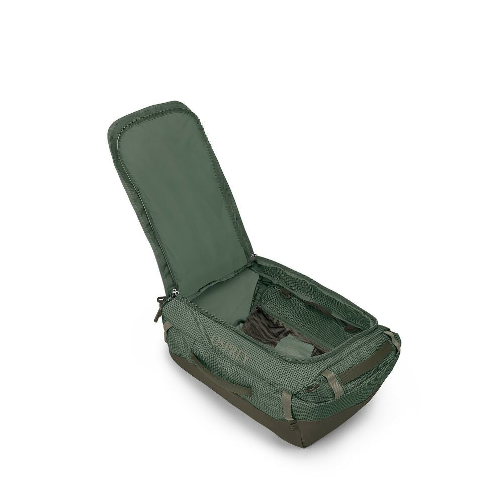 Green travel bag with open lid on a white background