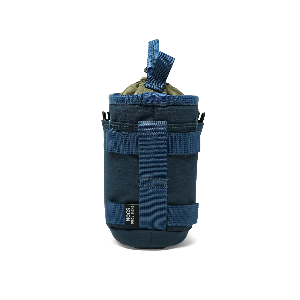 A dark blue tactical pouch with blue webbing straps and a top carry loop, shown on a clean white background. A small black brand tag on the lower front reads &
