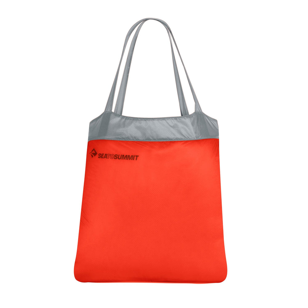 Red tote bag with grey handles on a white background