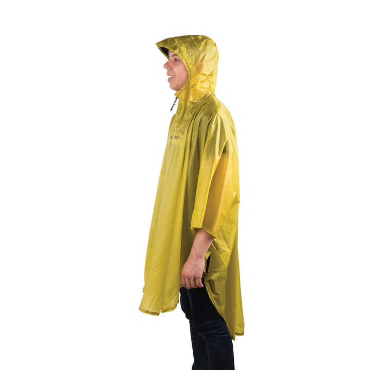Person wearing a yellow rain poncho on a white background