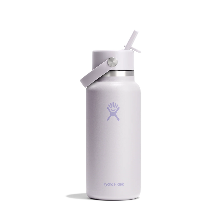 A Hydro Flask insulated water bottle in a pale lavender color, featuring the brand&