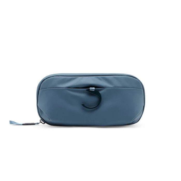 Blue toiletry bag on a white background