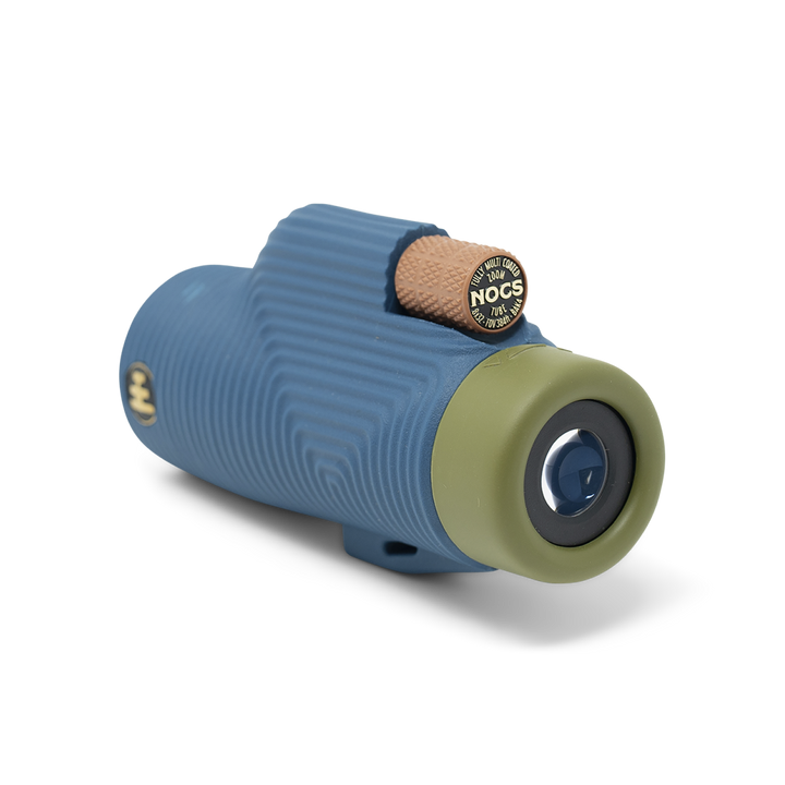 Texture blue monocular with green eyepiece