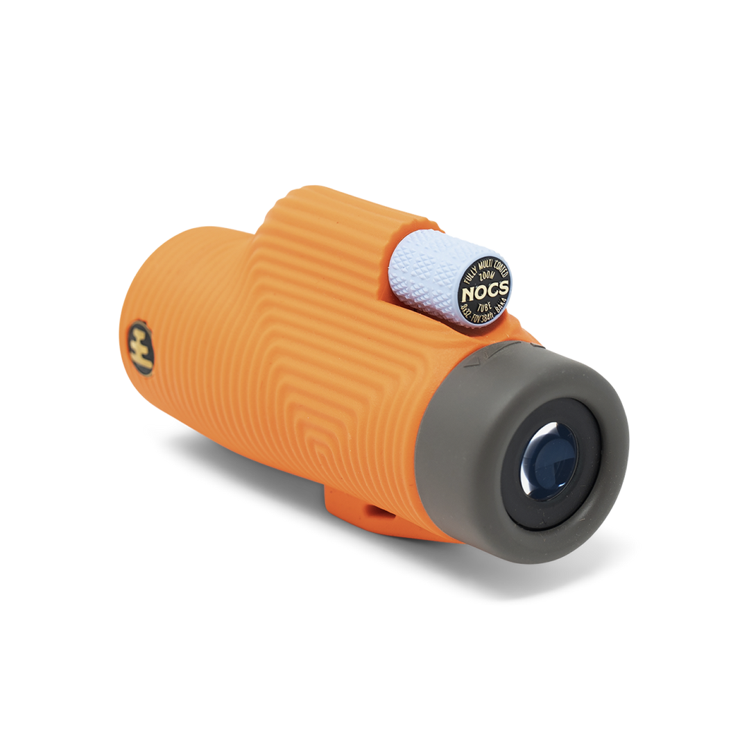 Orange monocular with gray eyepiece on a white background