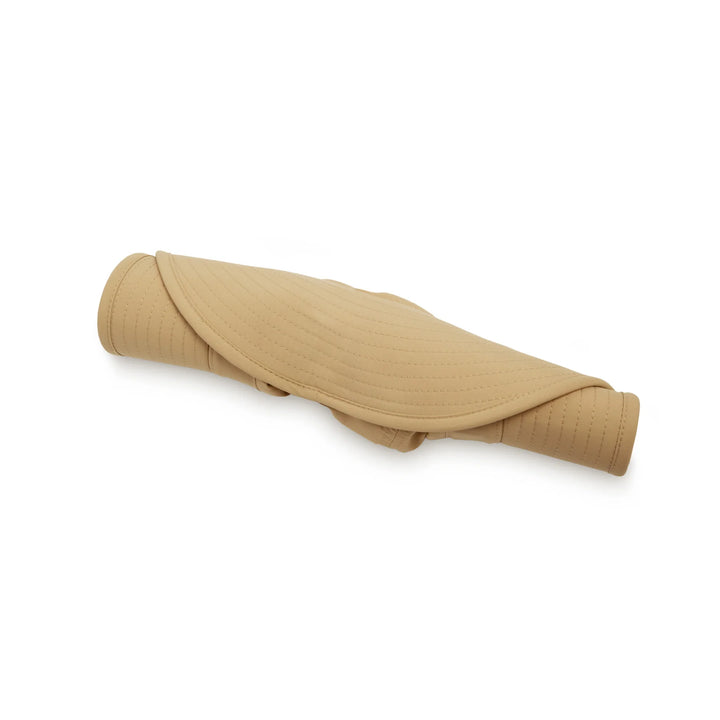 A rolled-up beige sun visor or protective head covering made of textured fabric, shown on a plain white background.