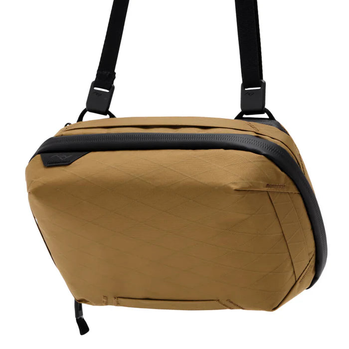 Brown bag with black accents on a white background
