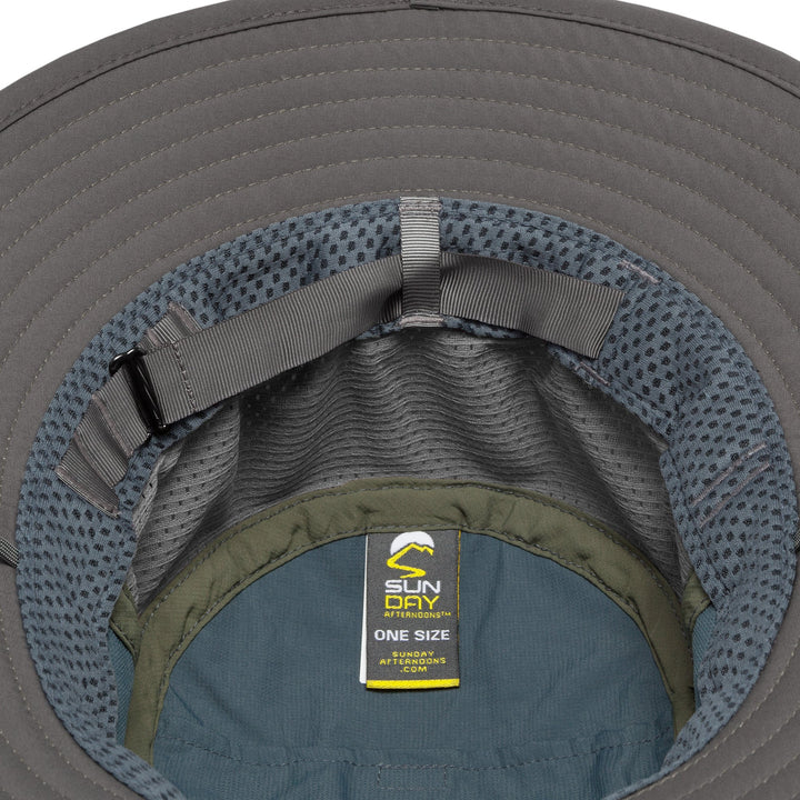 Close-up of a gray hat interior with a visible brand label.