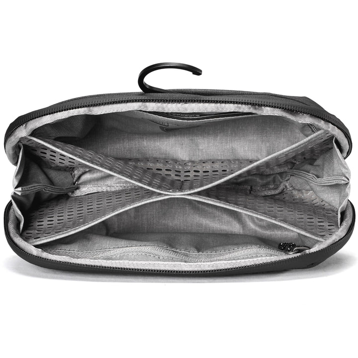 An open black zippered pouch or organizer bag showing a gray interior with multiple zip compartments, mesh pockets, and a black hanging loop at the top, photographed on a white background.