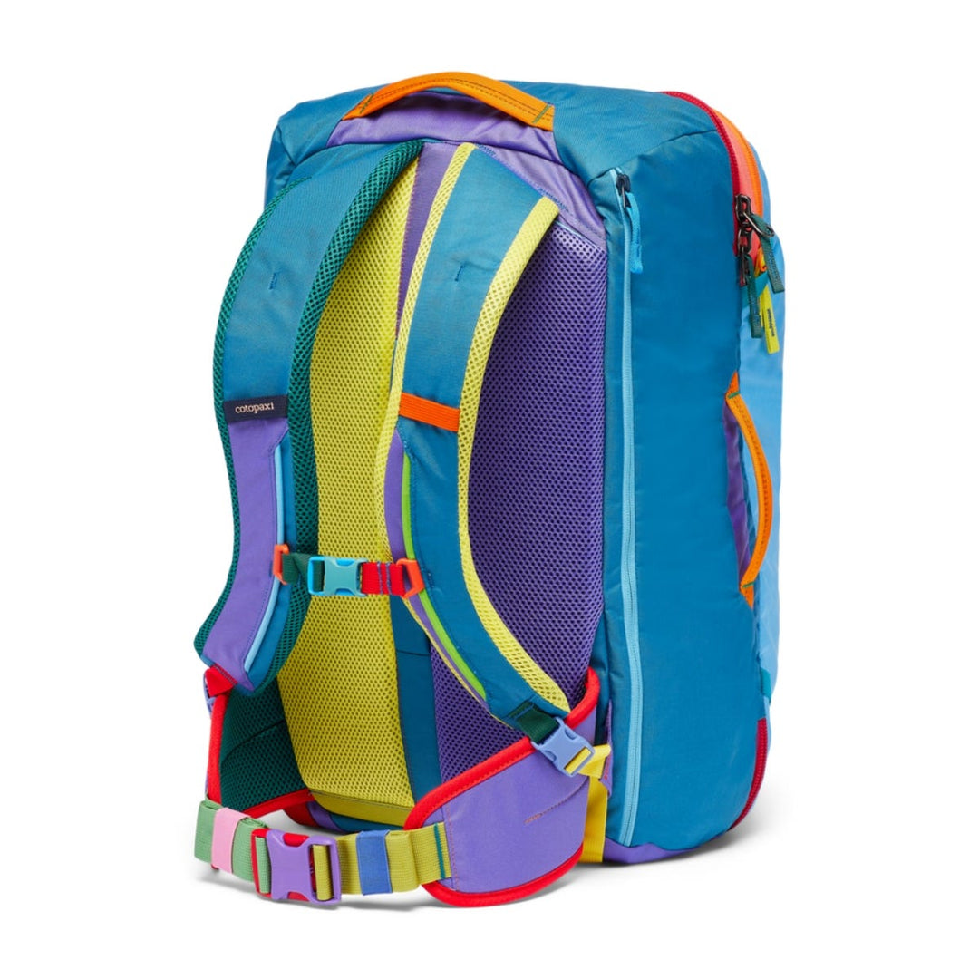 Colorful backpack with shoulder straps and a padded hipbelt