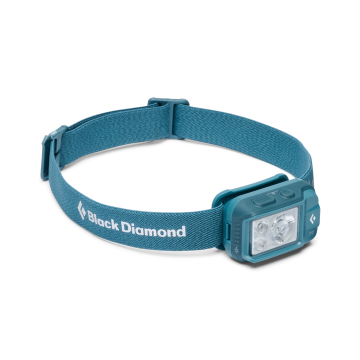 A Black Diamond headlamp with a teal blue adjustable fabric headband and a matching teal blue lamp housing, shown on a clean white background.