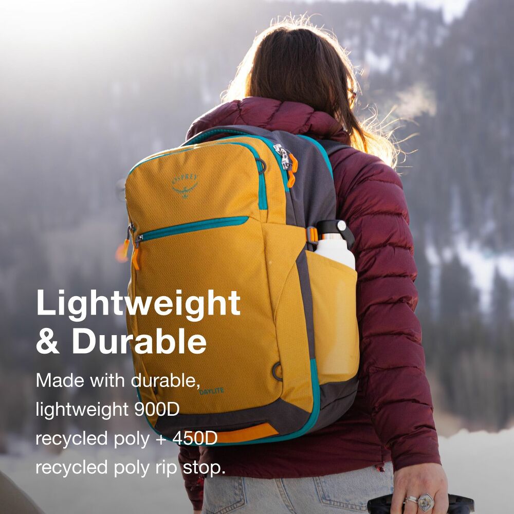 Person wearing a yellow backpack with scenic background