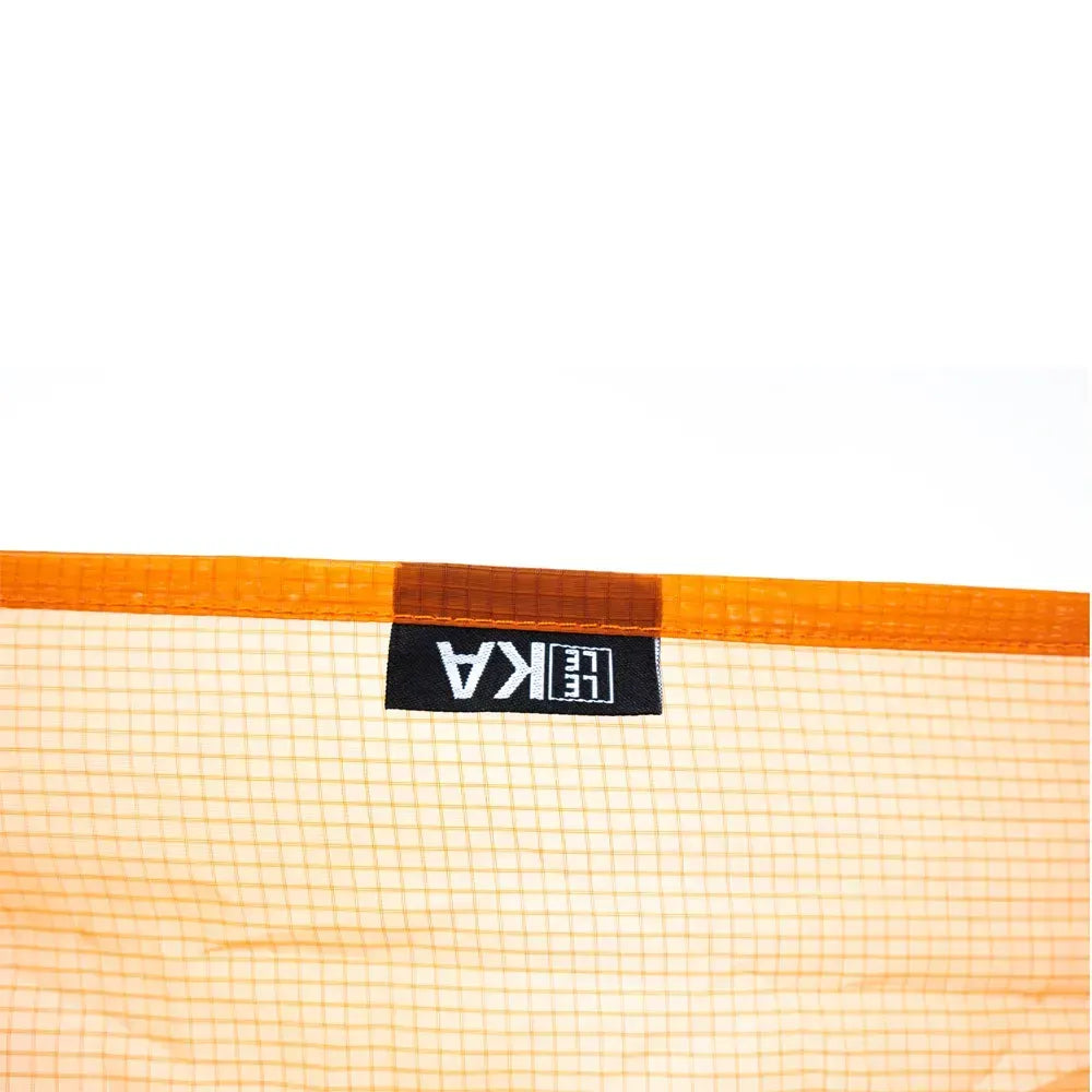 Orange mesh hammock with Leleka branding