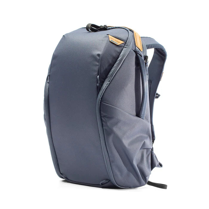 Dark gray/blue backpack with a visible brand logo on a white background