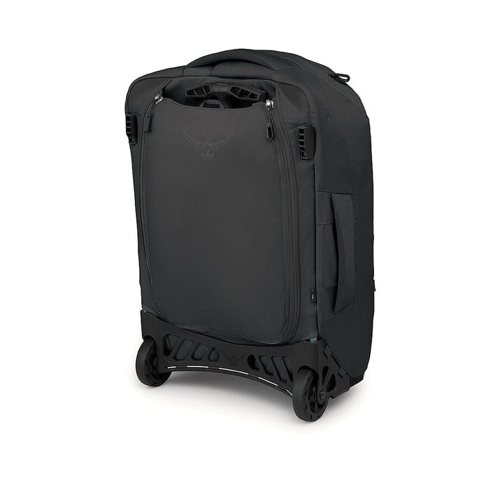 Black rolling suitcase on a white background