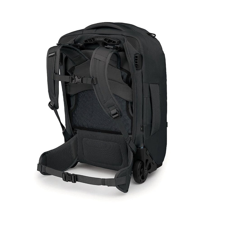 Black backpack with hip belt on a white background