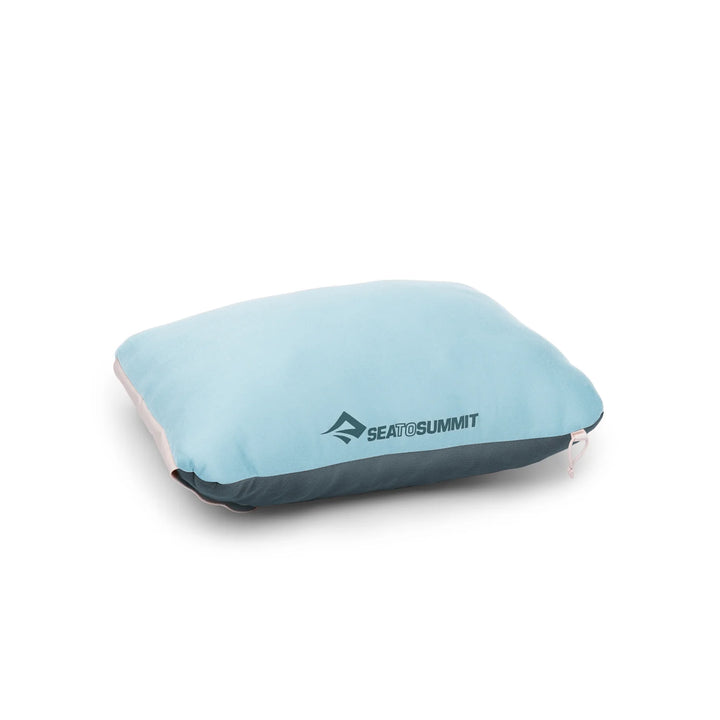 Light blue pillow with Sea to Summit logo on a white background