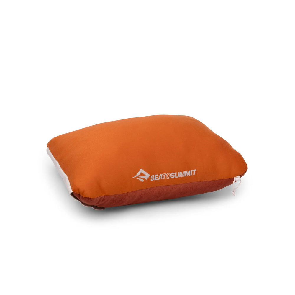 Orange camping pillow with Sea to Summit logo on a white background