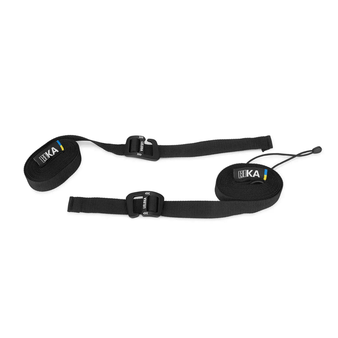 Black rolled up hammock strap with Leleka branding on a white background