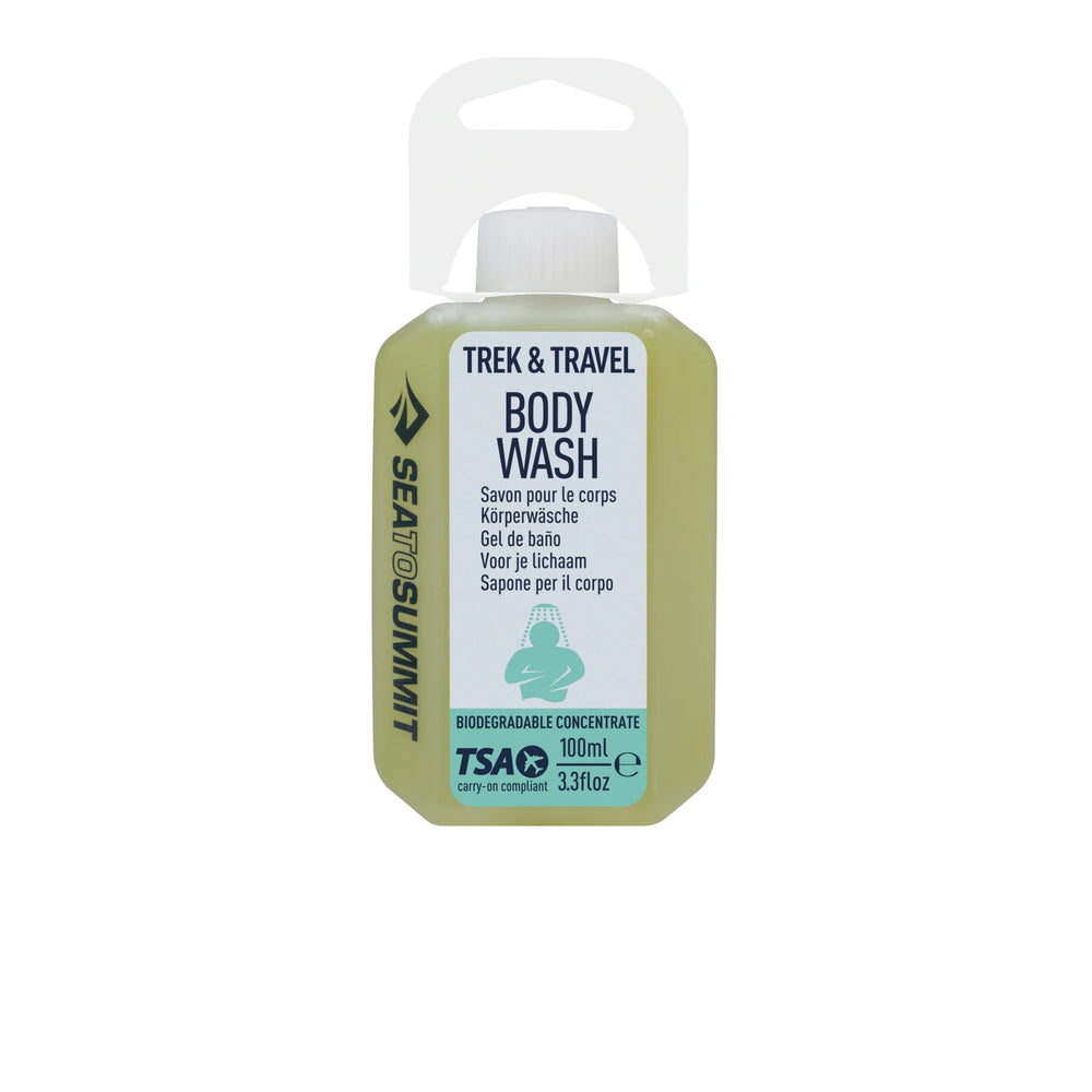 Sea to Summit Trek & Travel Body Wash in a 100ml plastic bottle with a white cap and a white hanging loop, featuring a white label with green and black text.
