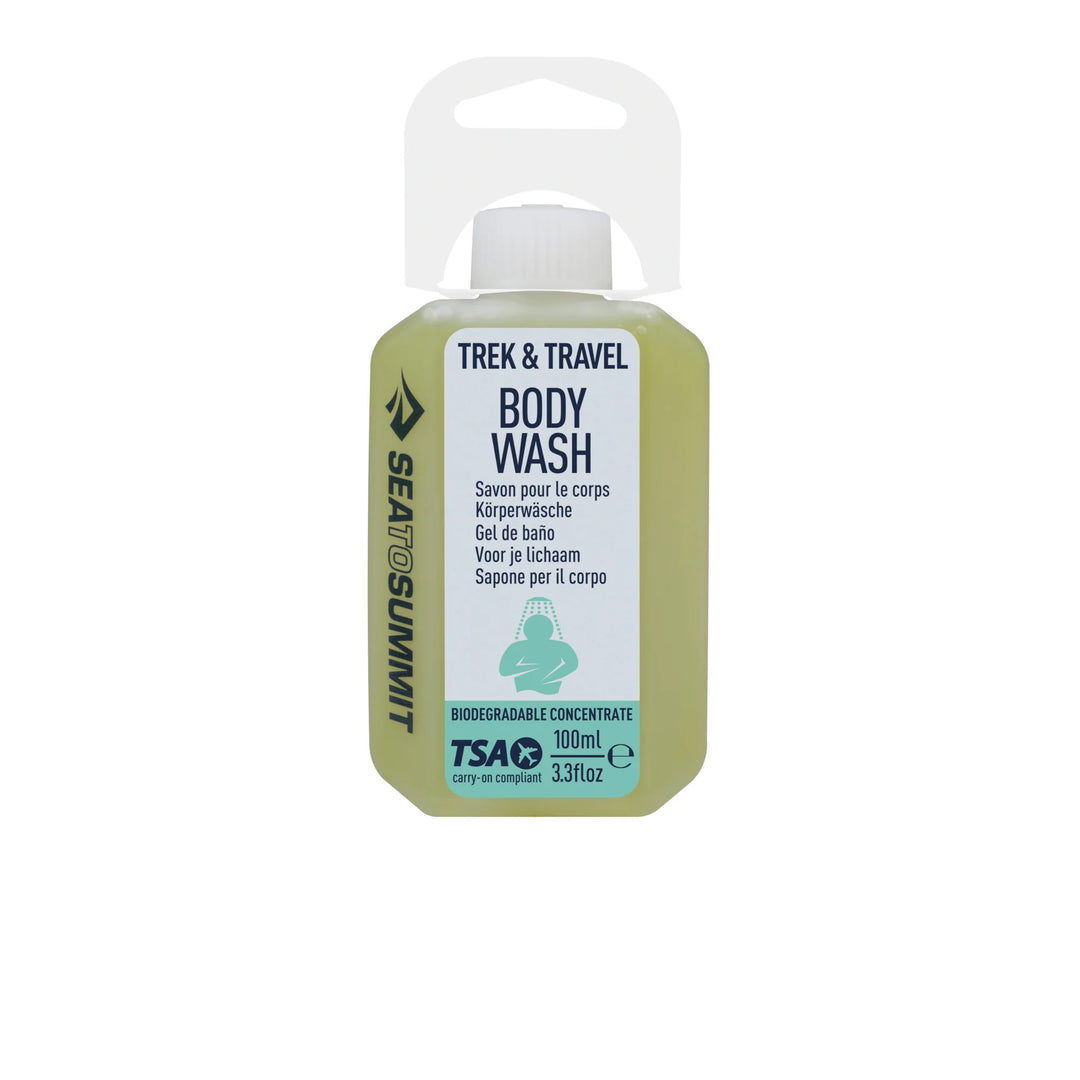 Sea to Summit Trek &amp; Travel Body Wash in a 100ml plastic bottle with a white cap and a white hanging loop, featuring a white label with green and black text.