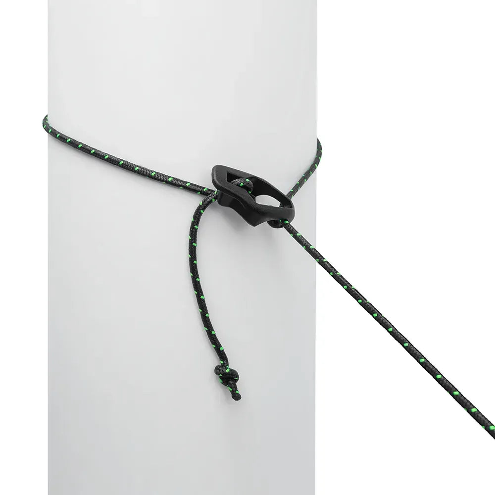 Black and green string around a pole on a white background