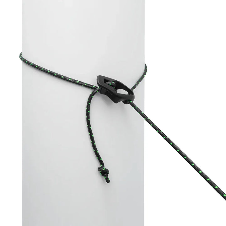 Black and green string around a pole on a white background