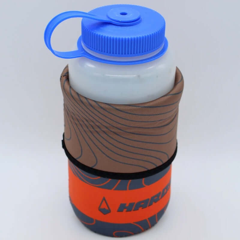 White water bottle with blue lid wrapped in a brown and orange sleeve on a white background