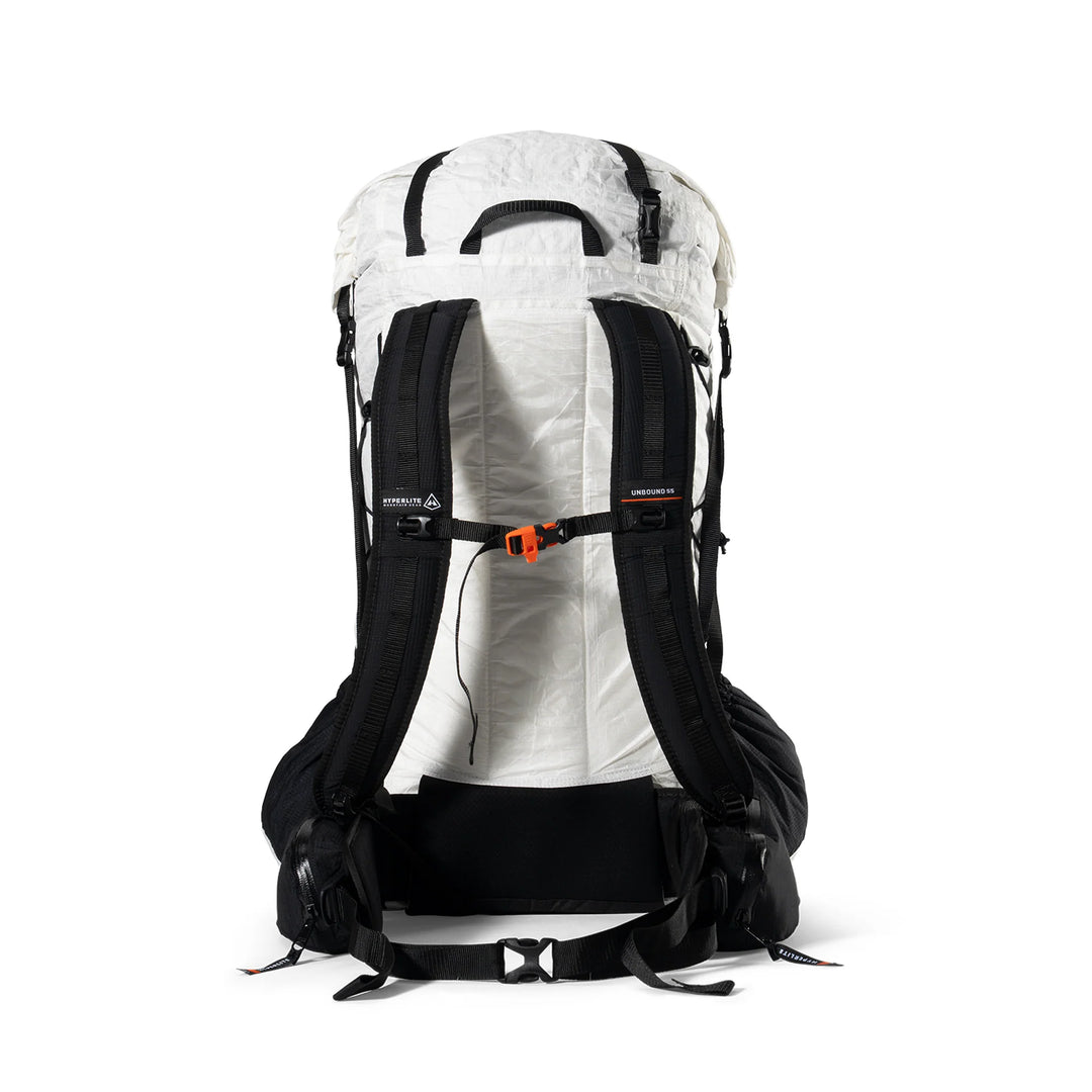 The rear view of a technical hiking backpack in white and black, featuring a breathable white shell, black padded shoulder straps, a black hip belt, and an orange quick-release buckle on the compression strap.