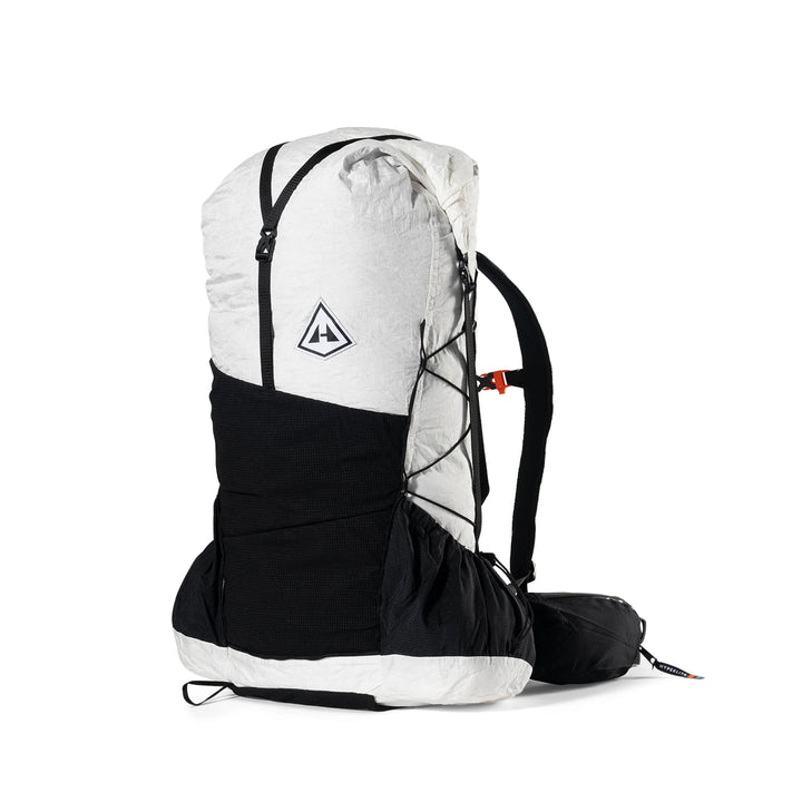 A technical outdoor backpack shown from the side against a plain white background. The backpack features a dual-tone design with a light heather gray top section and a solid black lower section, including the shoulder straps and hip belt.