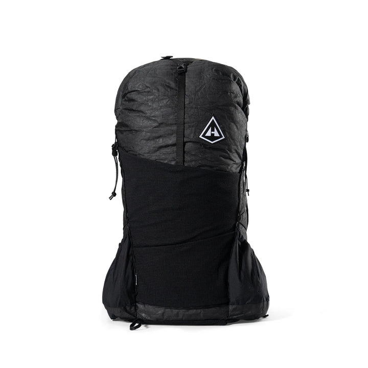 A black waterproof backpack cover with a white triangular logo on the front, shown on a clean white background.