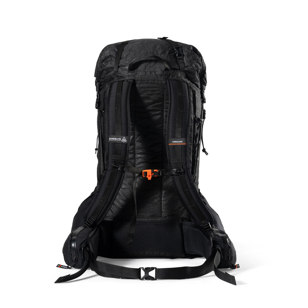 A black technical hiking backpack shown from the back, featuring padded shoulder straps, compression buckles, and an orange quick-release buckle, photographed on a clean white background.