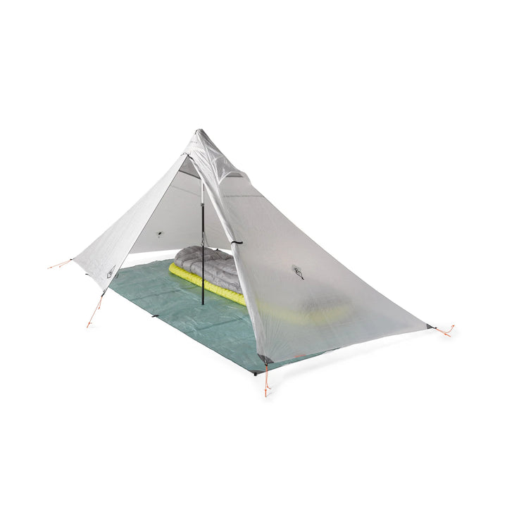 Camping tent with a sleeping pad inside on a white background