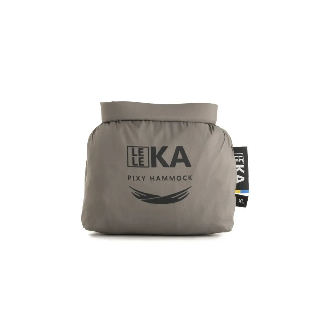 A gray Leleka Pixy Hammock in its folded, packed state, featuring the black Leleka logo and a small black size tag on the right side, set against a plain white background.