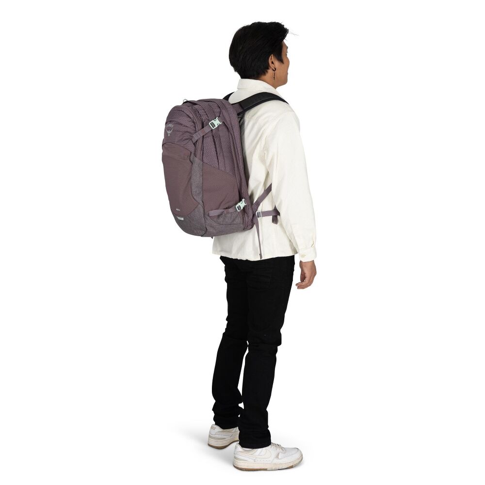 Person wearing a gray backpack on a white background
