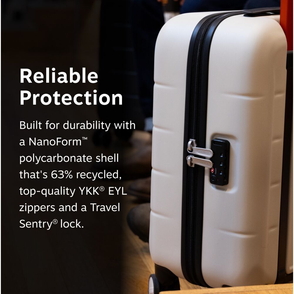 A cream-colored hard-shell suitcase with black trim and a digital lock, shown next to promotional text highlighting its durable NanoForm polycarbonate shell and recycled materials.