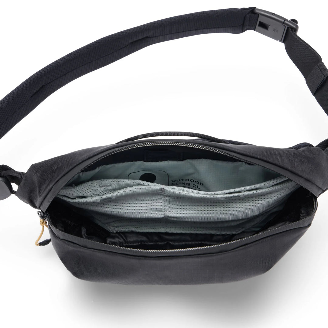 Black crossbody bag with open compartment on a white background