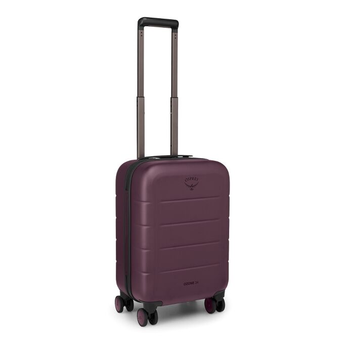 A hard-shell spinner suitcase in a deep plum purple color, featuring a telescoping handle extended upwards and the Osprey logo on the front, set against a plain white background.