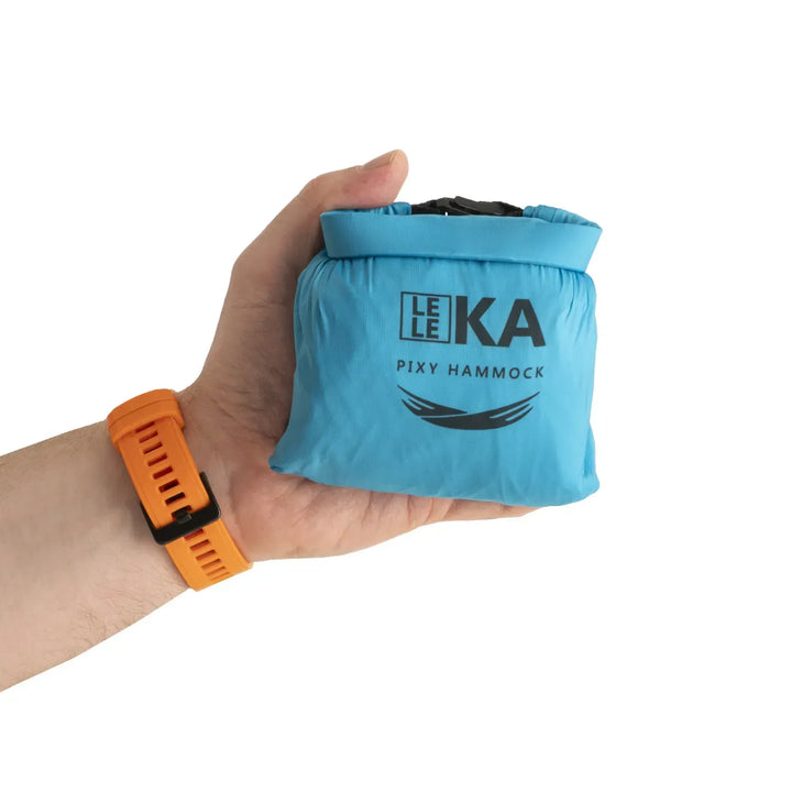 Hand holding a blue hammock with LeleKa branding on a white background