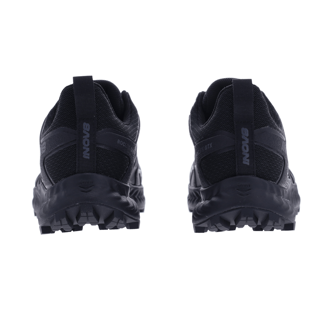 Back of a pair black hiking shoes with INOV8 branding