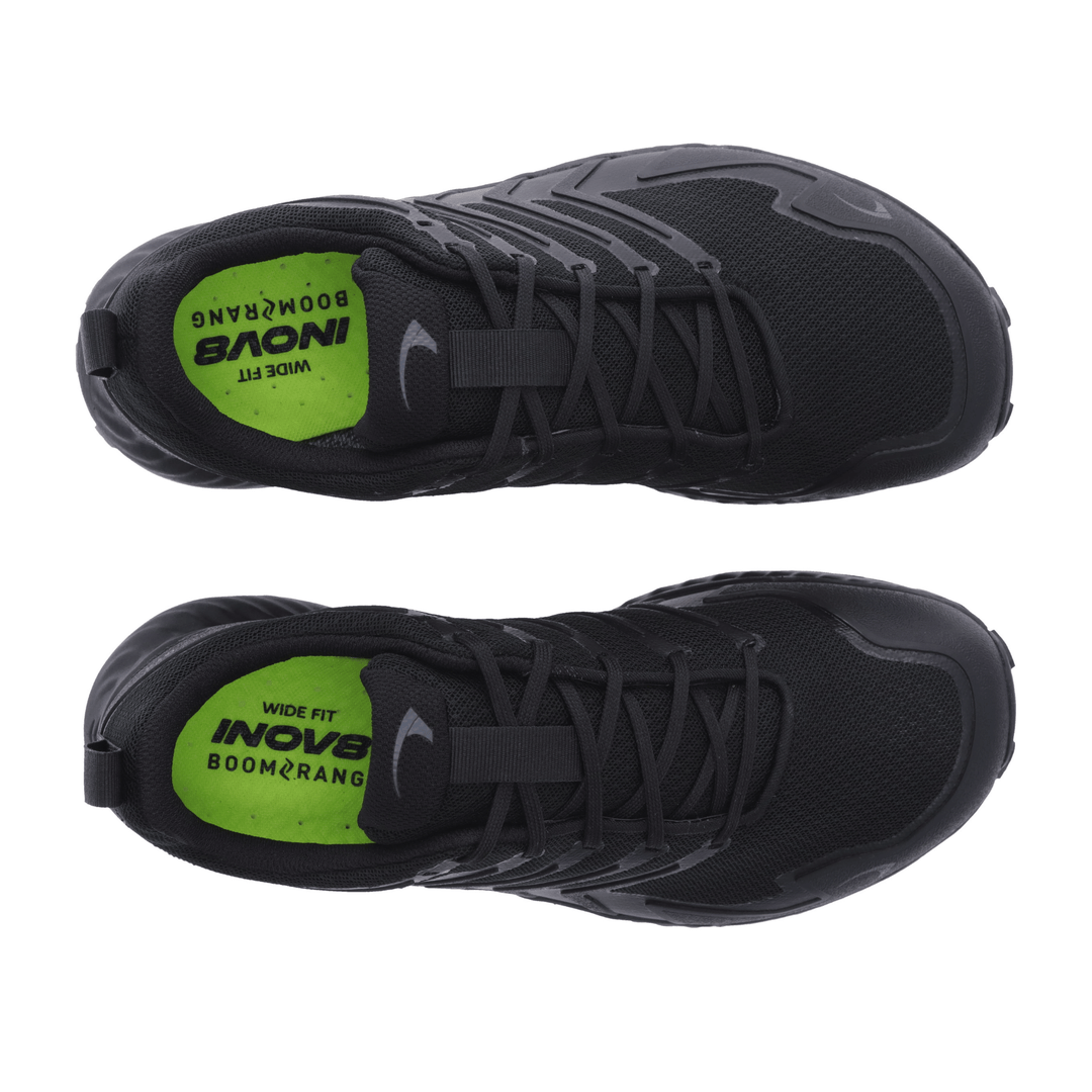 Birdseye view of a pair of black hiking shoes with green insoles
