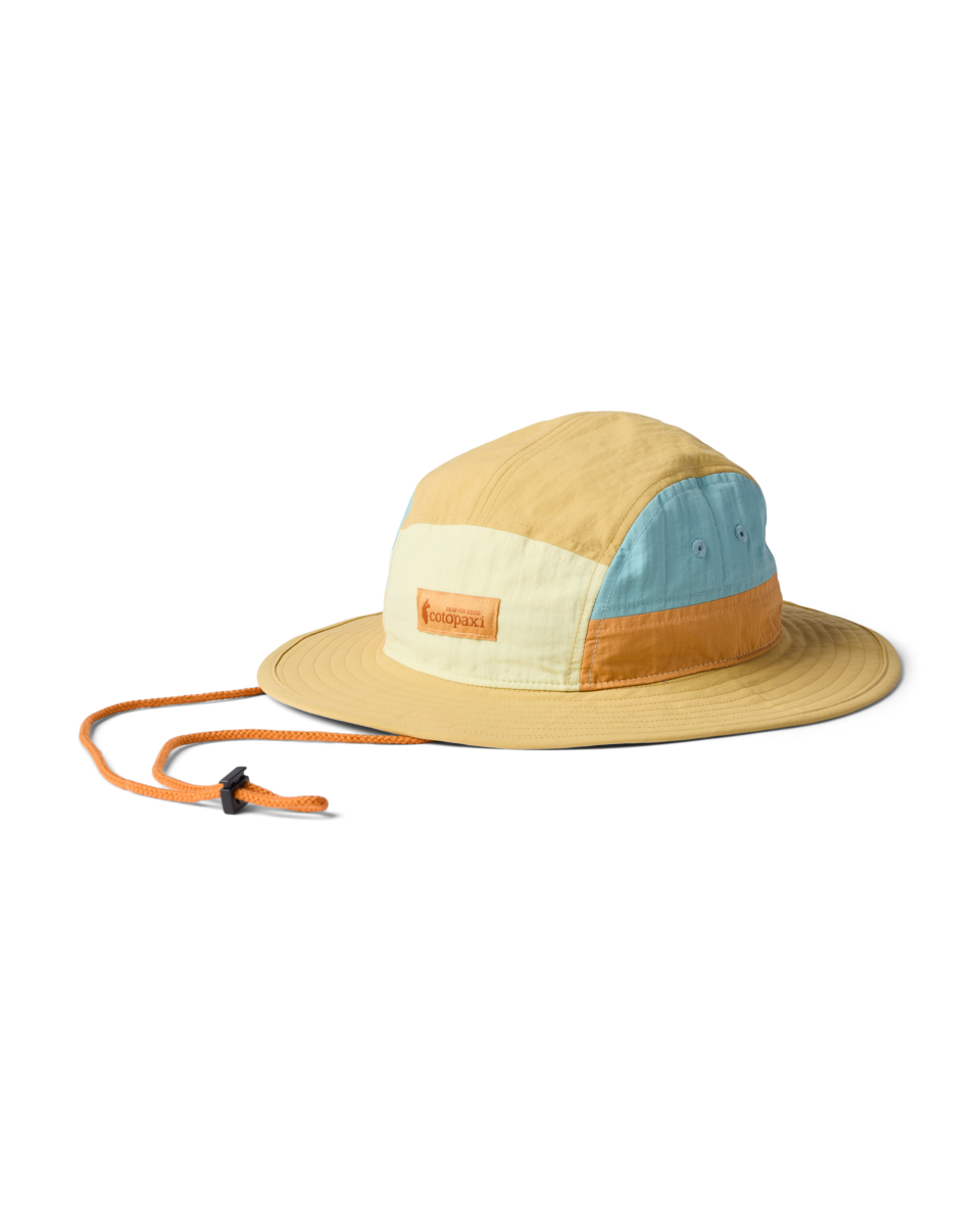Color-blocked bucket hat with an orange strap on a white background