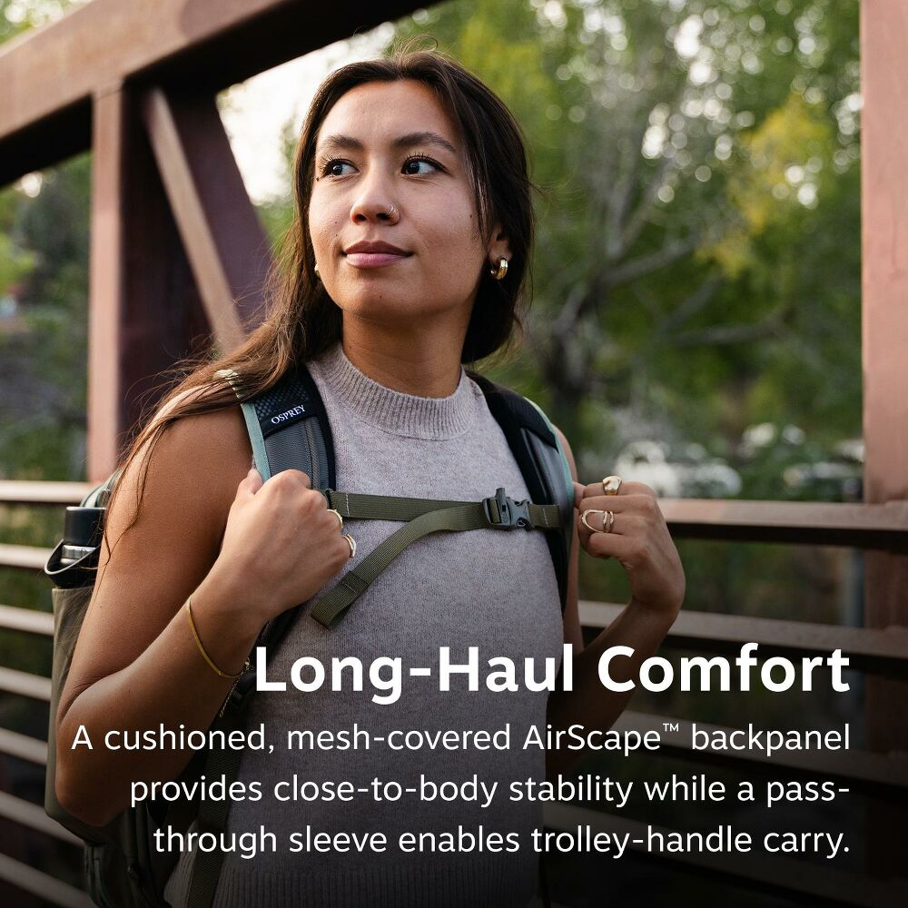 Woman with a backpack outdoors, highlighting comfort features of the backpack.