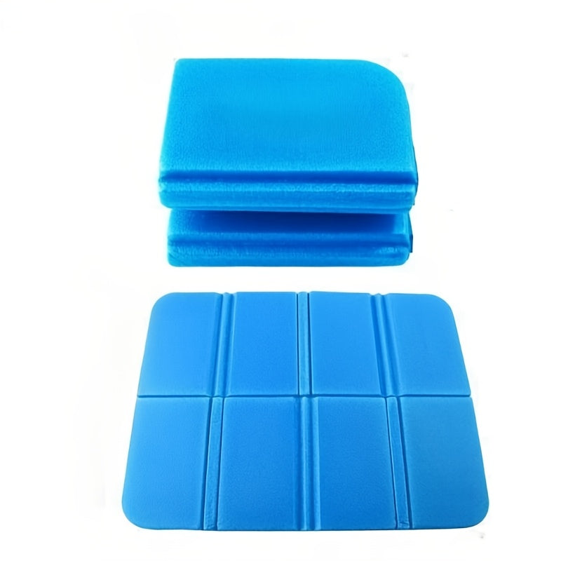 Blue foam pads stacked on a white background