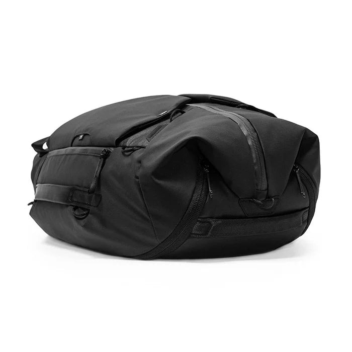 Black travel duffel bag on a white background
