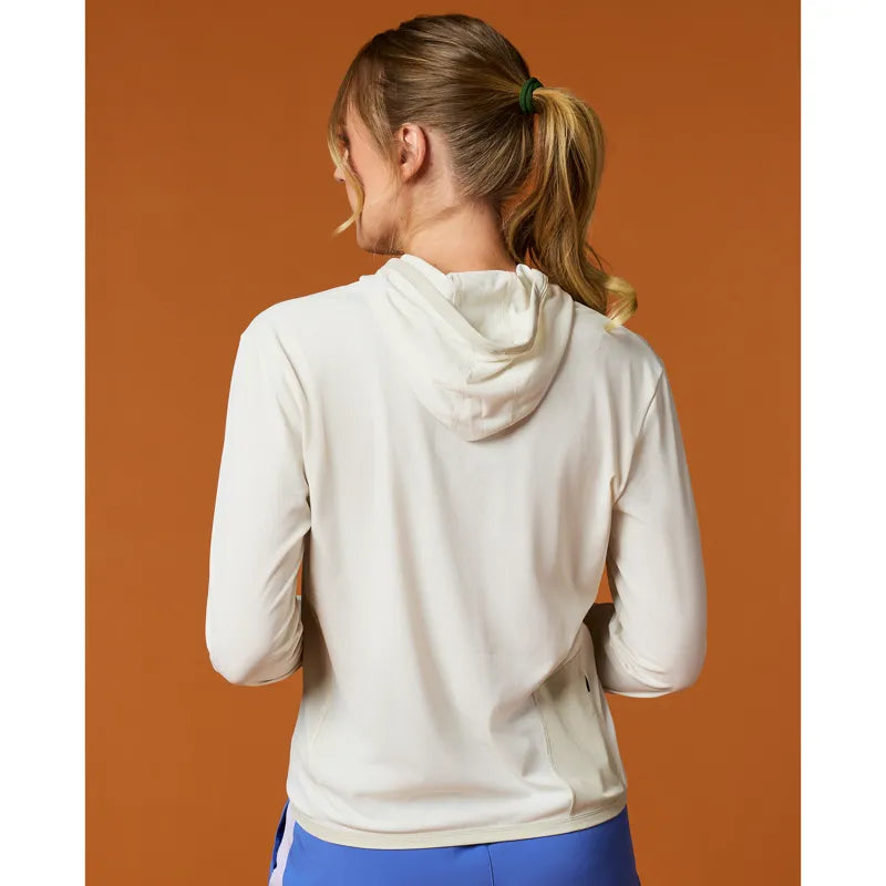 Person wearing a white hoodie with a orange background