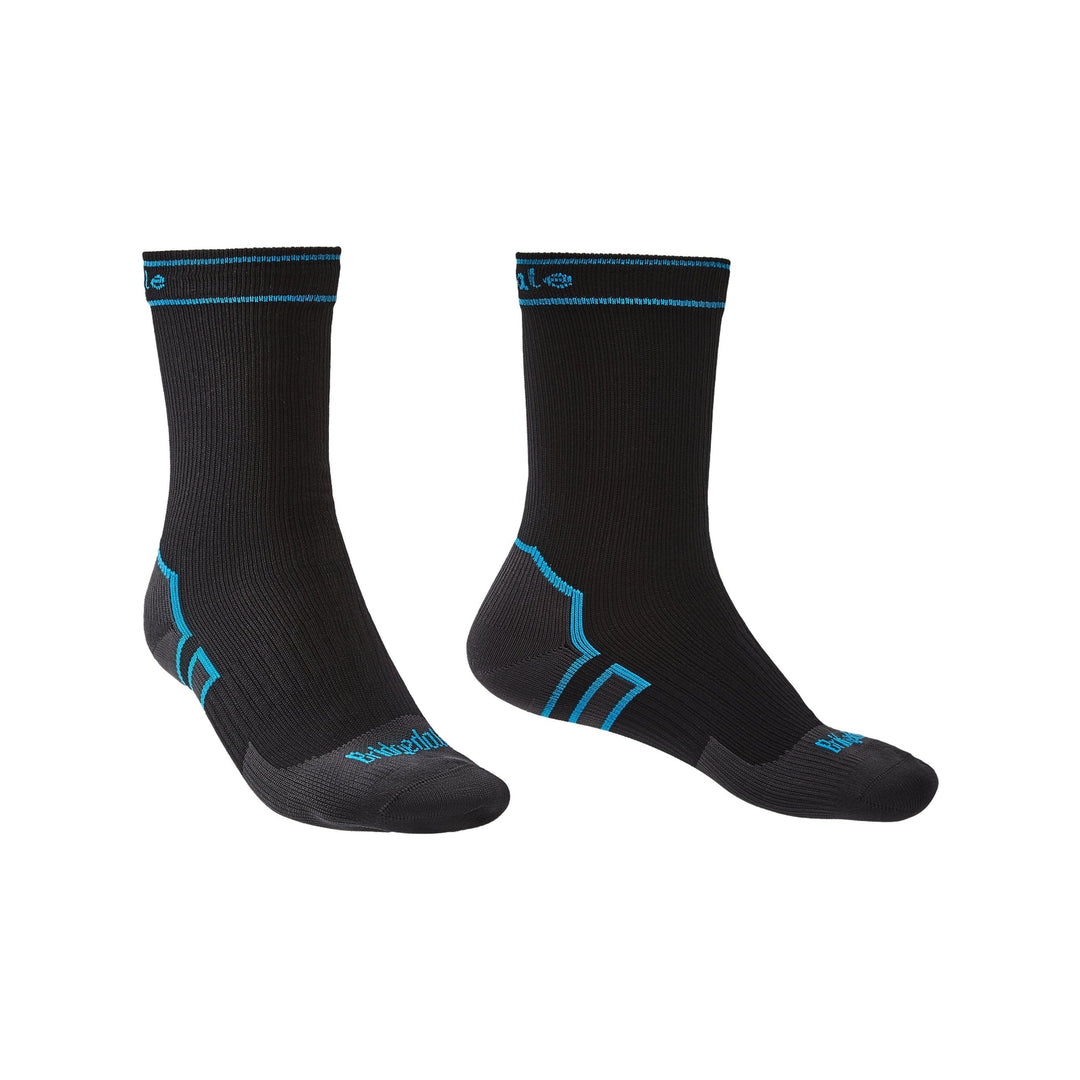 Pair of black socks with blue accents on a white background