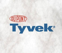 A close-up view of a DuPont Tyvek branded fabric, showcasing its texture and the logo.