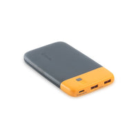 A gray and orange Biolite Charge 20 PD power bank with USB-C and USB-A ports.
